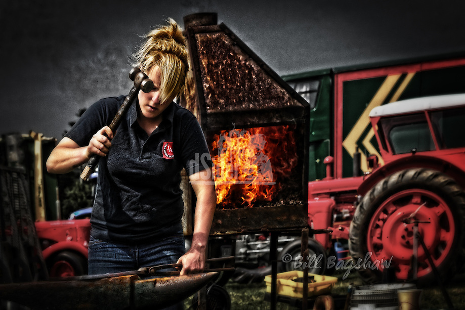 Echt Show. 2013 was the 160th anniversary of The Echt Show. Lady blacksmith making horse shoes at Echt show. copyright Bill Bagshaw photography www.dsider.co.uk online magazine, photo courses (Bill Bagshaw & Martin Williams/Bill Bagshaw, dsider.co.uk)