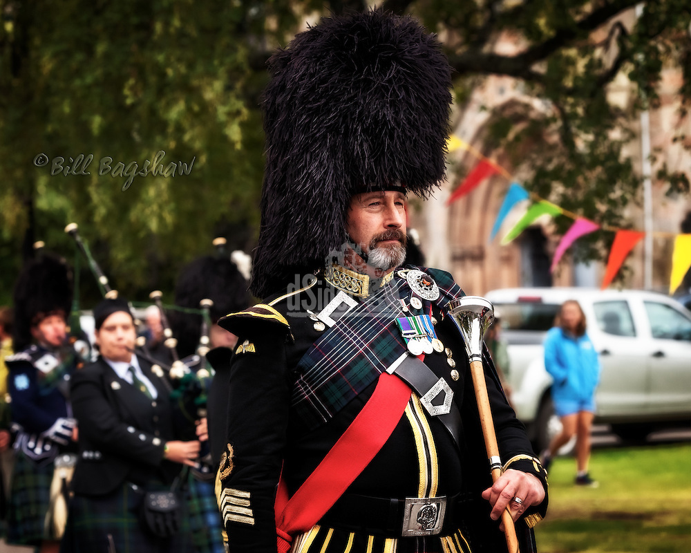 Drum major at 150th Ballater Highland Games in 2014. Massed pipe bands parade past Ballater Church (Bill Bagshaw/M.Williams/COPYRIGHT)
